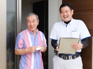 スタッフのお客様との笑顔